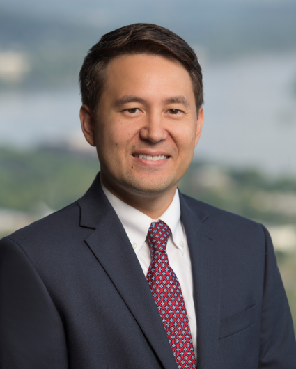 Adam D. Reid headshot